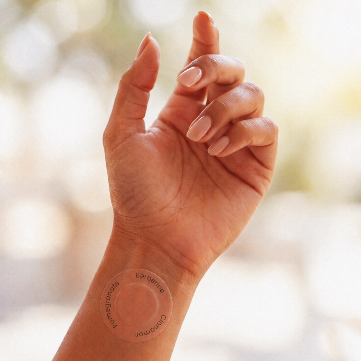 A LifeGauge patch worn on the wrist